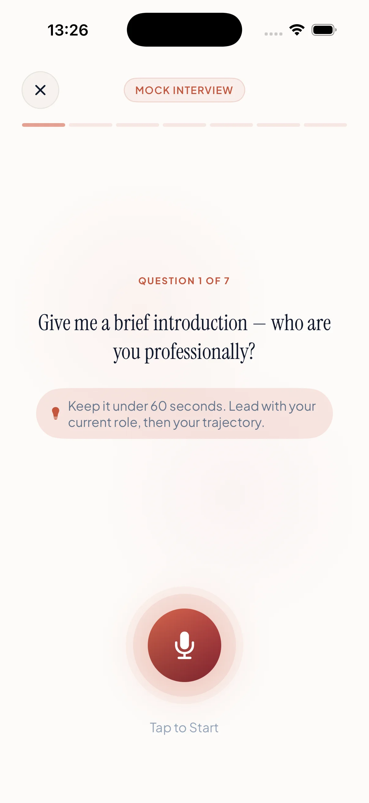 Gravitas mock interview screen showing question 1 of 7 with a coaching tip and tap-to-start microphone.