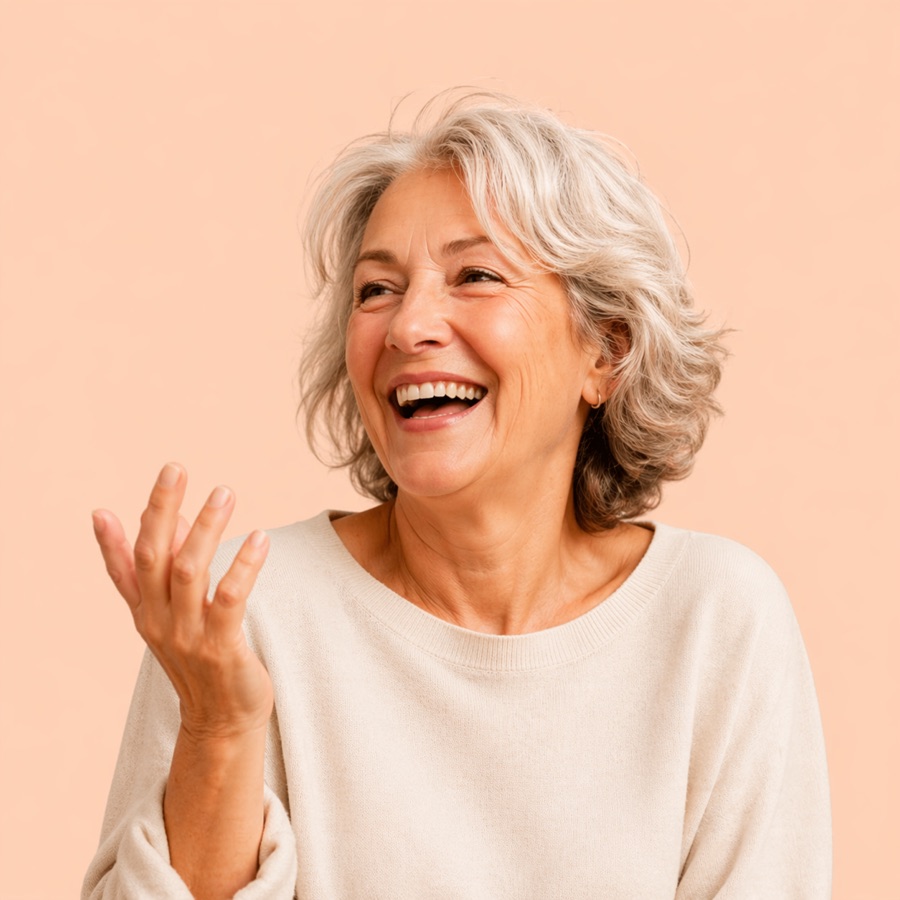 A speaker laughing mid-thought